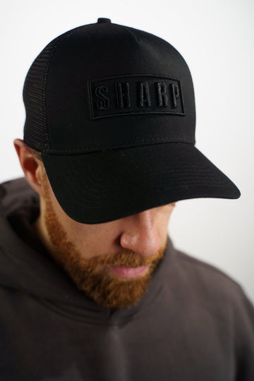 Black on Black Sharp Trucker